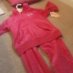 A pink jacket and sweatpants from juicy couture